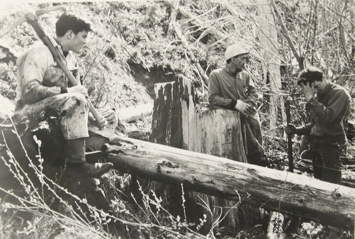 From left, the late Bill Goward, Ken Sinkiewicz and Paul Statham were members of a work party that gated the cave entrance to deter vandals. (T.W. Paterson collection)