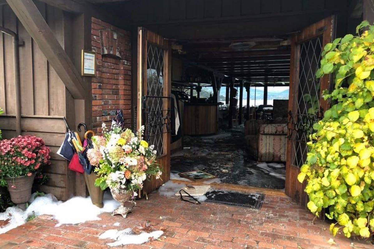 This photo, posted to social media Sunday shows extensive damage to the dining room at Deep Cove Chalet after a fire broke out in the North Saanich restaurant late Saturday evening. (Liz Waibel/Facebook)