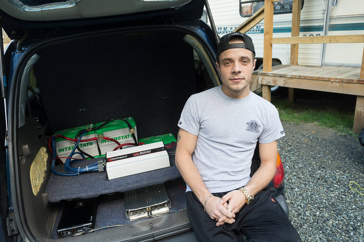Dustin Hamilton has an 8,000-watt amplifier powered by five car batteries in the back of his PT Cruiser, but he can no longer play it while in Central Saanich. (Hugo Wong/News staff)
