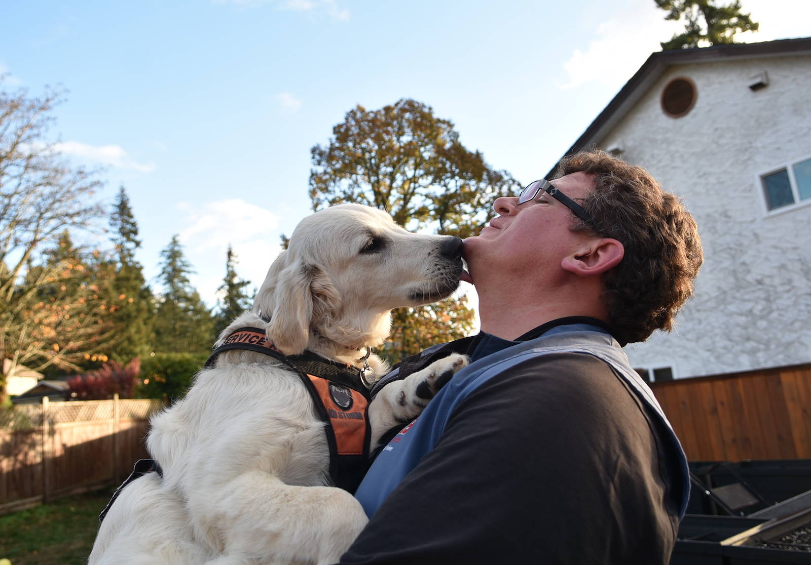 Service dog trainer and veteran Tyson King is training Groot to help him with his own PTSD. Groot is replacing his longtime service dog Cully, who he recently retired to a fellow veteran as a pet. (Hugo Wong/News Staff)