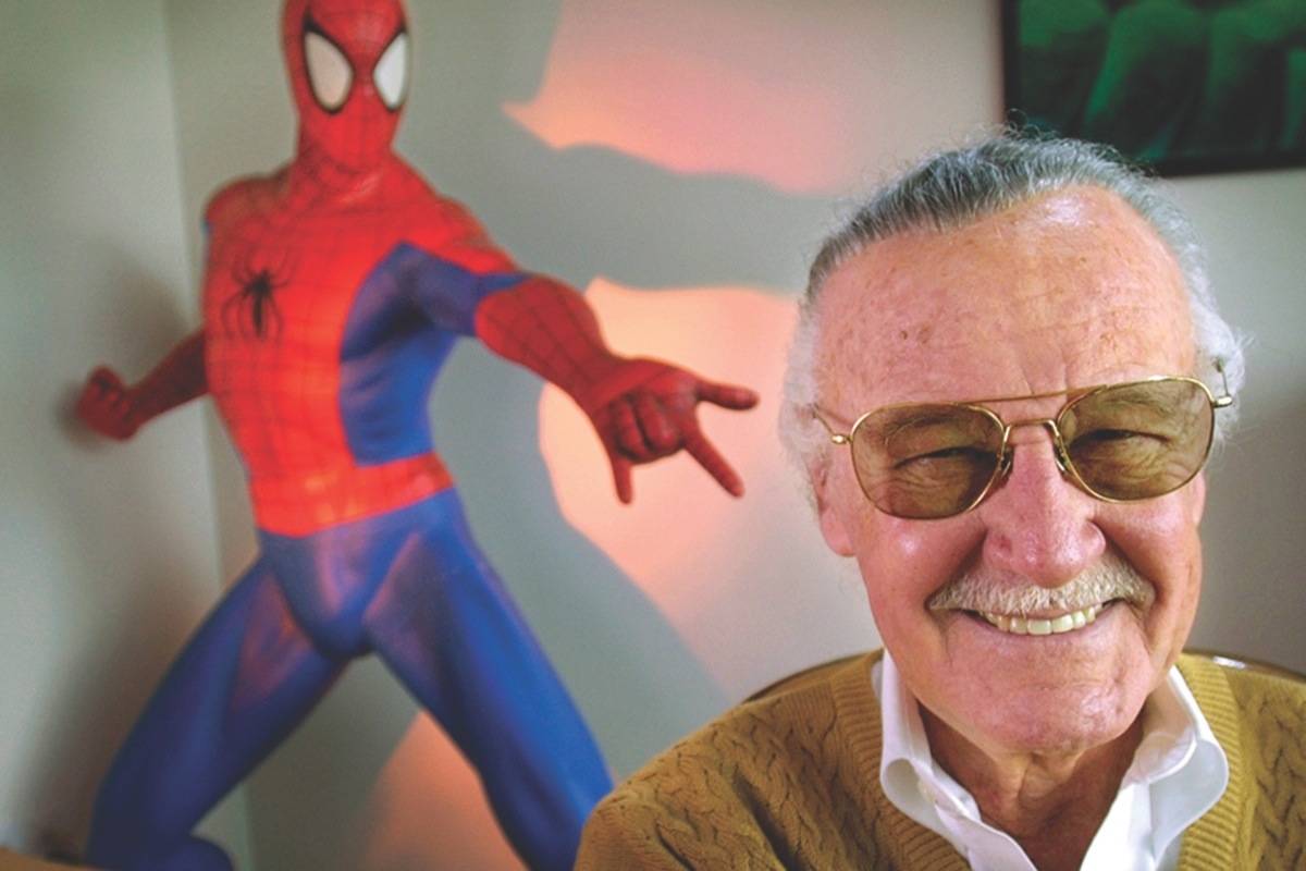 FILE - In this April 16, 2002, file photo, Stan Lee, 79, creator of comic-book franchises such as “Spider-Man,” “The Incredible Hulk” and “X-Men,” smiles during a photo session in his office in Santa Monica, Calif. Comic book genius Lee, the architect of the contemporary comic book, has died. He was 95. (AP Photo/Reed Saxon, File)