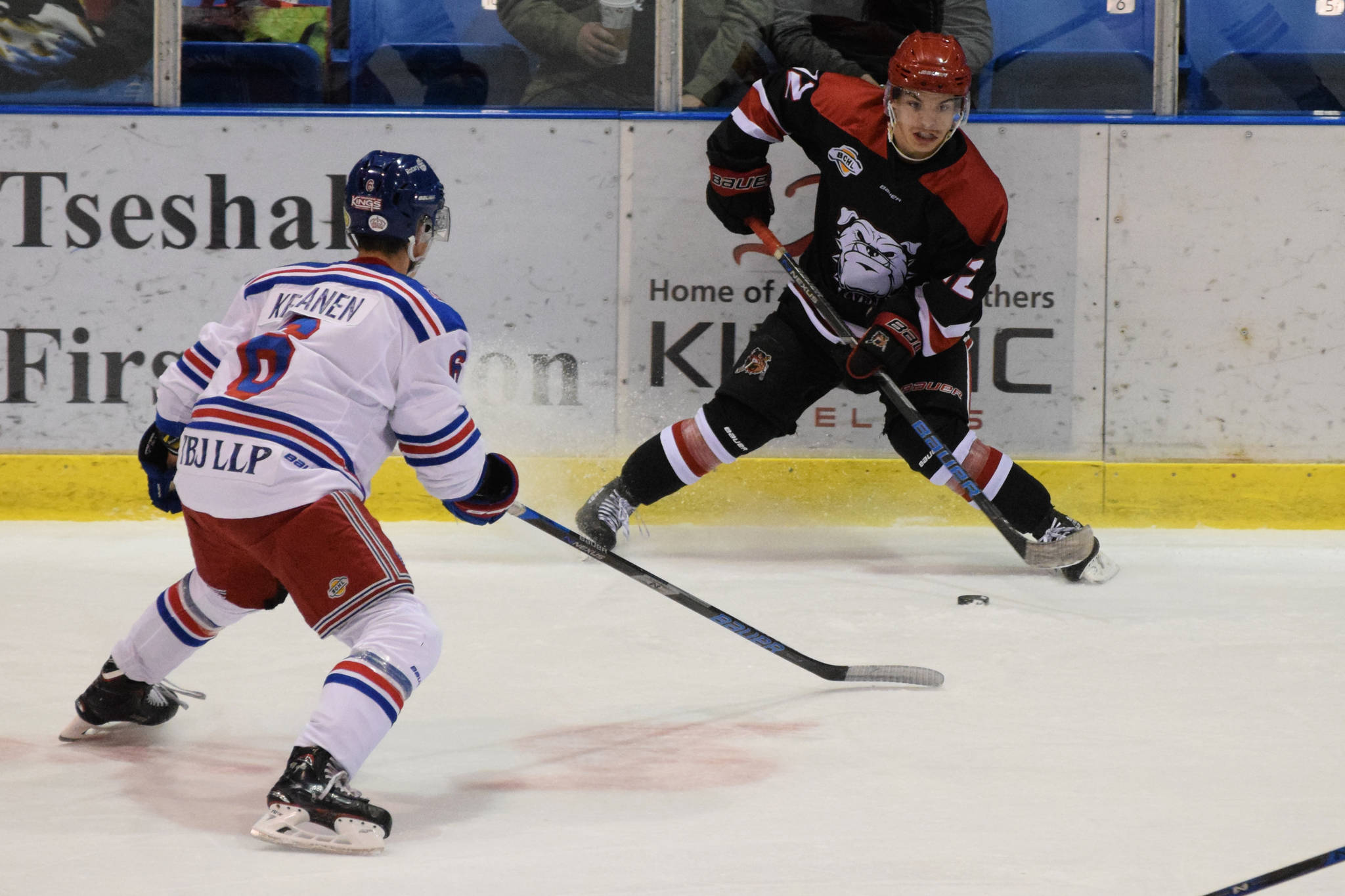 Alberni Valley Bulldogs forward Jackson Doucet squares off against a pair of Prince George Spruce Kings during a home game on Saturday, Nov. 17. ELENA RARDON PHOTO