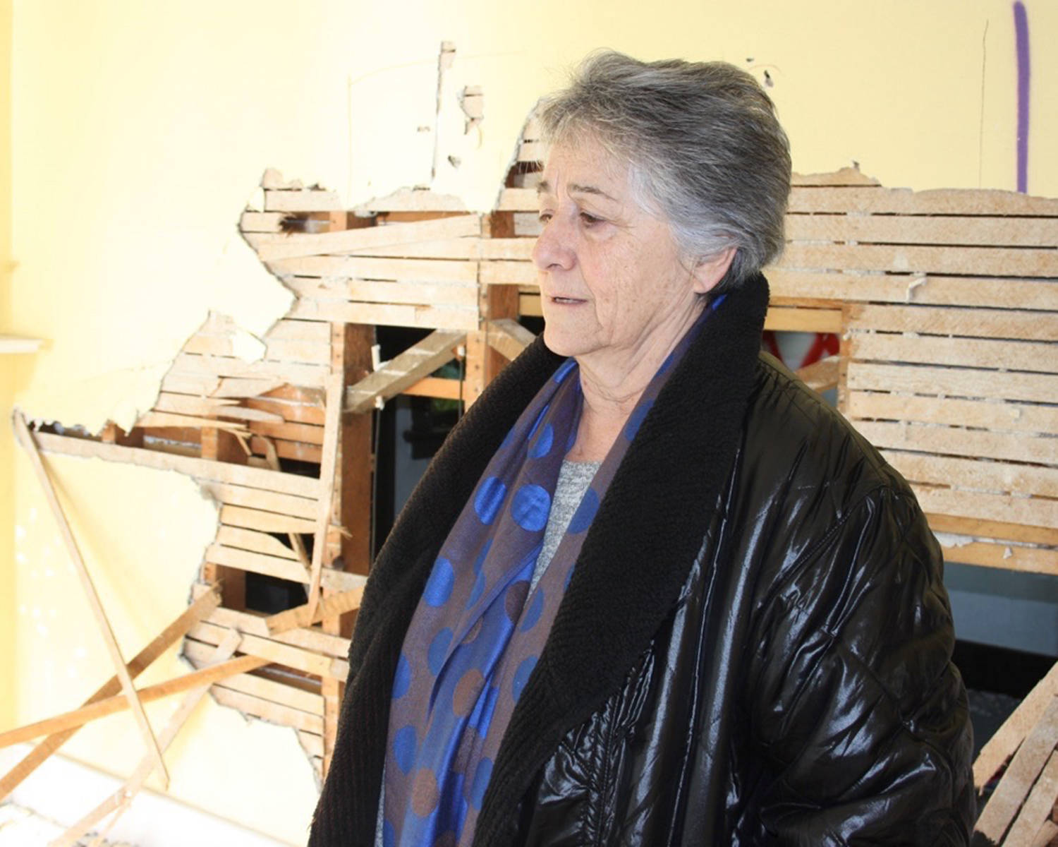 Frédérique Philip examines the room that was once her daughter’s bedroom. Vandals have all but destroyed the historic mansion she once rented. (Tim Collins/ Sooke NEws Mirror)
