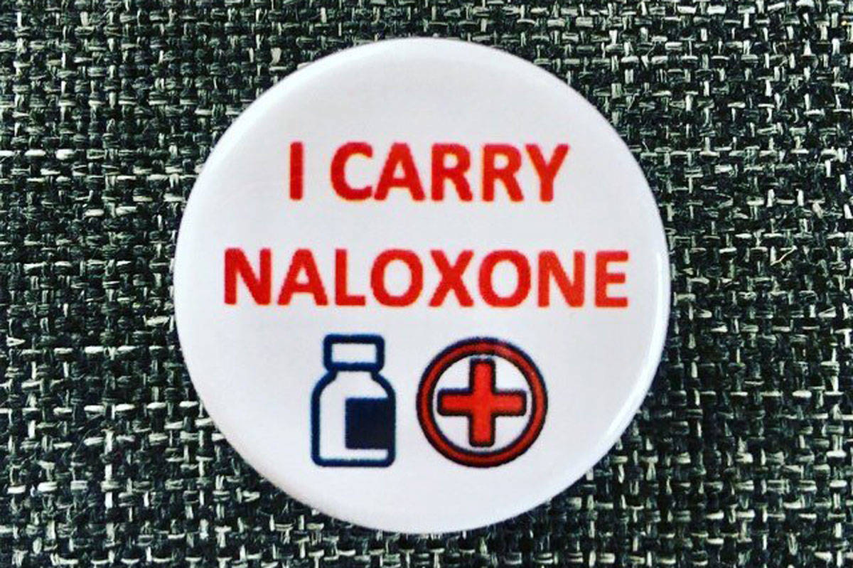 Victoria-based Gaëlle Nicolussi makes ‘I carry naloxone’ buttons to help raise awareness about the opioid crisis. (Courtesy of Gaëlle Nicolussi)