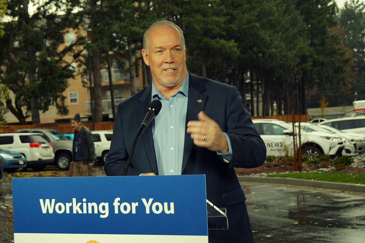 Premier John Horgan announces an additional 80 units of affordable rental housing in Langford on Nov. 23. (Rick Stiebel/News staff)