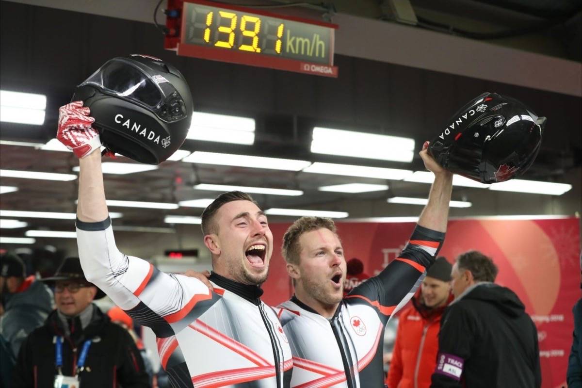 Team Canada���s Justin Kripps and Alex Kopacz celebrate their gold medal in the men���s two-man bobsleigh event at PyeongChang 2018 (David Jackson/COC)