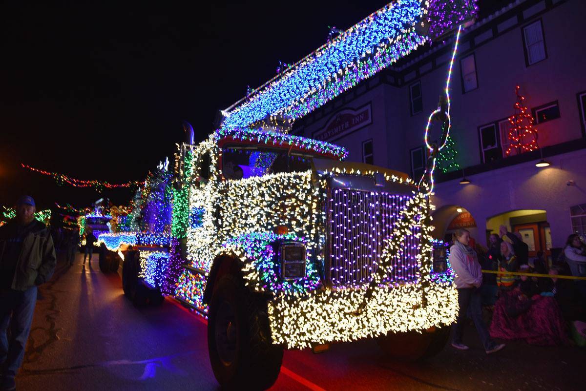 A truck makes its way down First Avenue as part of the 30th Festival of Lights parade in 2017. (Mike Gregory Photo)