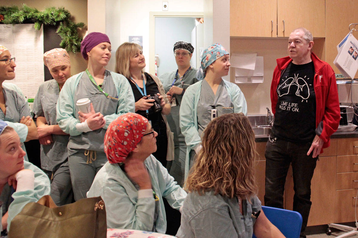 Tony Duke shares his double lung transplant story with Victoria General Hospital staff as he visits for BC Transplant’s Operation Popcorn on Dec. 5. (Keili Bartlett/News staff)