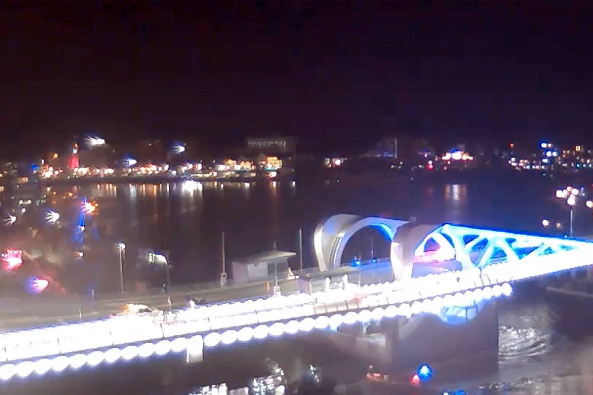 VicPD received multiple 911 calls just after 1:30 a.m. after the intoxicated man was seen falling into the water below the bridge. (City of Victoria webcam)