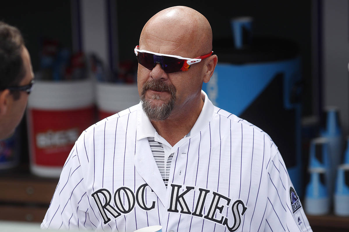 File-This June 23, 2018, file photo shows retired Colorado Rockies outfielder Larry Walker during picture day for the Rockies before a baseball game in Denver. Walker made a significant leap in Hall of Fame voting only to fall short in his ninth year on the ballot. The longtime player for the Montreal Expos, Colorado Rockies and St. Louis Cardinals finished with 54.6 percent. That was up more than 20 percent from a year ago. He thinks analytics may have boosted his case. (AP Photo/David Zalubowski, File)