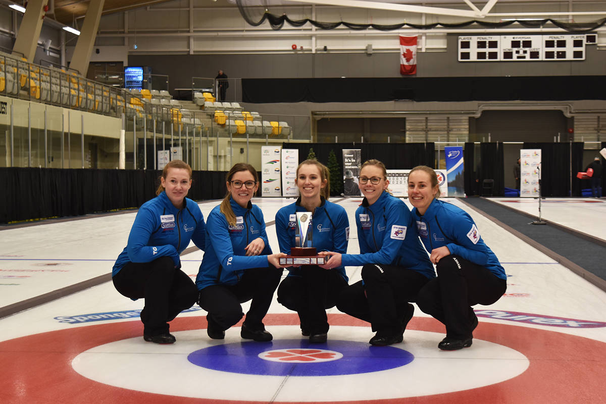 Team Wark poses on the ice with their 2019 Scotties B.C. Women’s Curling Championship trophy. Pictured from left are skip Sarah Wark, third Kristen Pilote, second Carley Sandwith, lead Jen Rusnell and fifth Michelle Dunn. Heather Norman photo