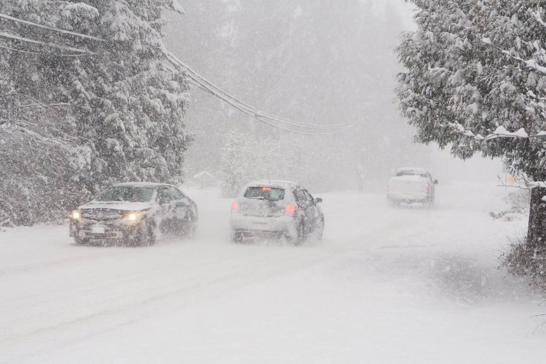 Roads were snowy in North Oyster on Sunday. CHRIS BUSH/The News Bulletin