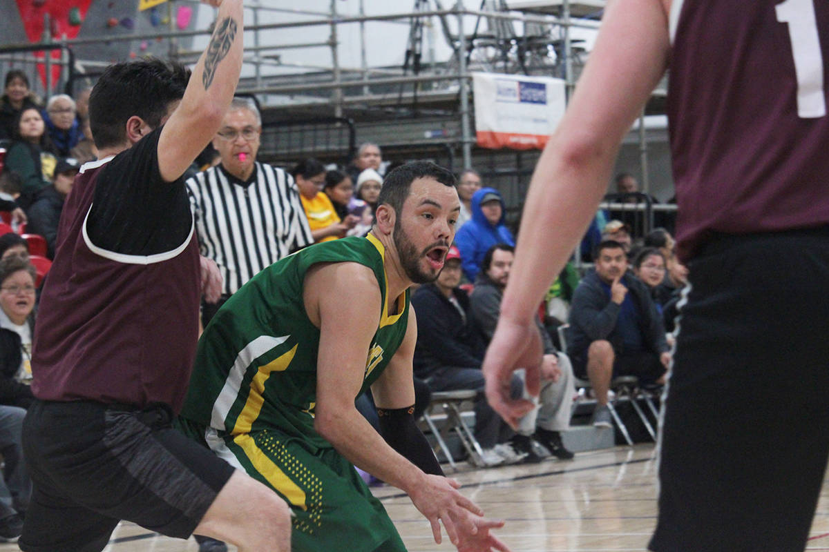 Randy Robinson Jr. tries to get around his man in Kitkatla’s opening game against Hazelton in the Master’s division (Nicholas Laws / The Northern View)
