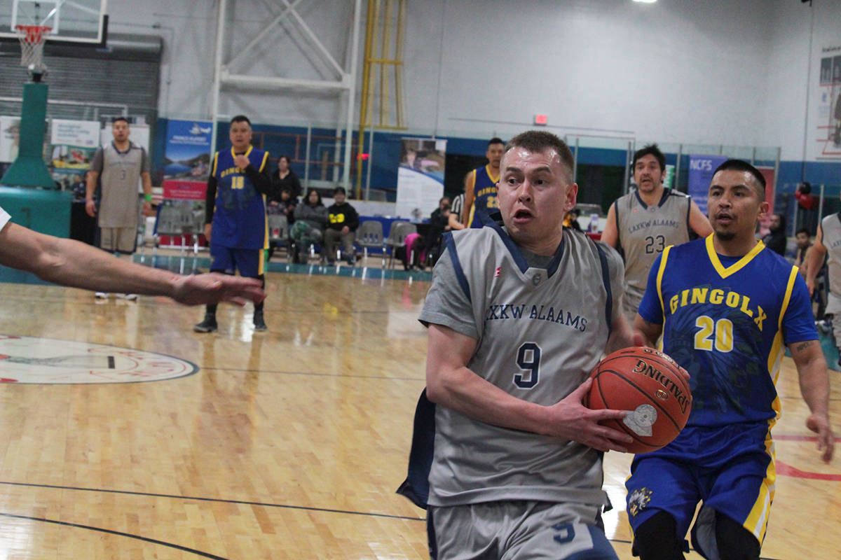 Brandon Sampson drives to the hoop in Lax Kw’alaams game against Gingolx (Nicholas Laws / The Northern View)