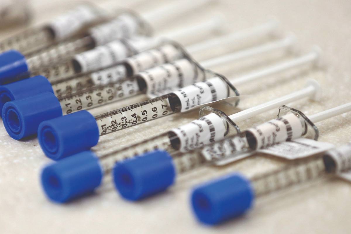 This June 1, 2018 file photo shows syringes of the opioid painkiller fentanyl in an inpatient pharmacy. (AP Photo/Rick Bowmer, File)