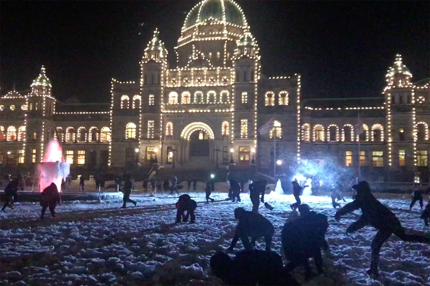Hundreds turned out for a giant snowball fight on the lawn of the B.C. Legislature Tuesday night. (Keri Coles/News staff)