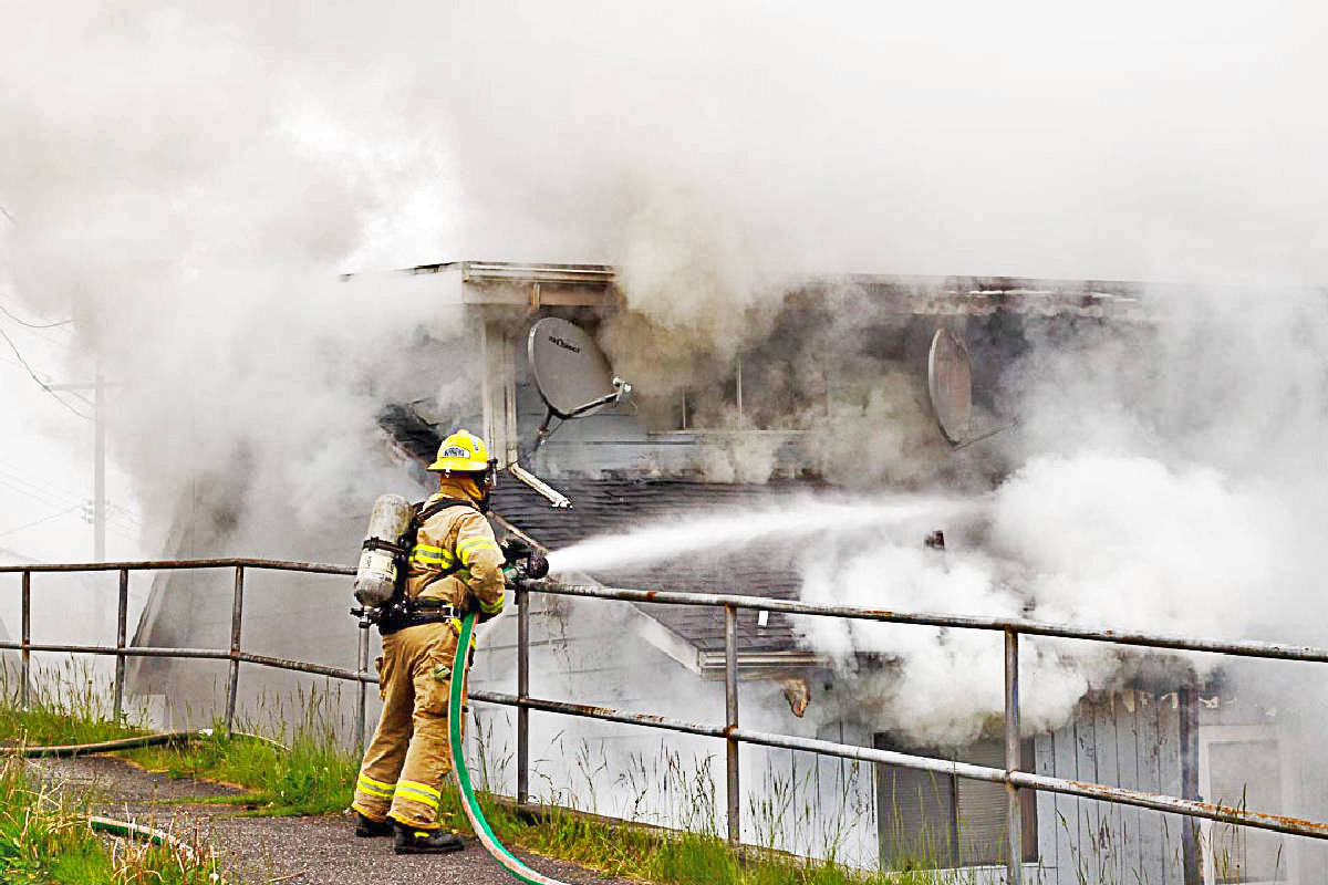 Fire fighters battled a fire at a multi-family home on the 800 block of Fulton Street on June 6, 2017. (Matthew Allen / The Northern View)