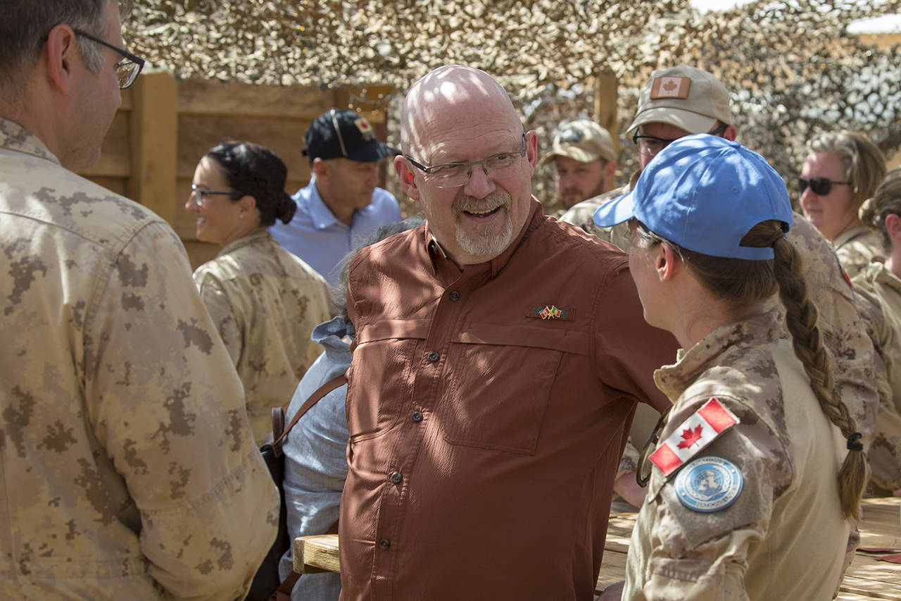 NDP MP Randall Garrison (centre) spoke with Canadian troops deployed in Mali as part of a peacekeeping mission during a visit in mid February (File contributed/Randall Garrison)