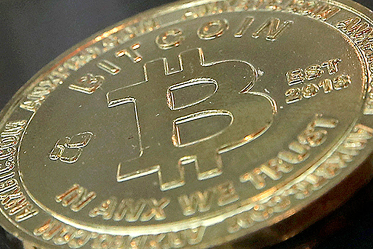 The high-profile search for $190 million in missing cryptocurrency owed to users of the beleaguered QuadrigaCX trading platform has turned up a small amount of digital assets, but the intrigue surrounding the case deepened Friday as investigators pointed to a series of transactions they can’t explain. (AP Photo/Kin Cheung, File)