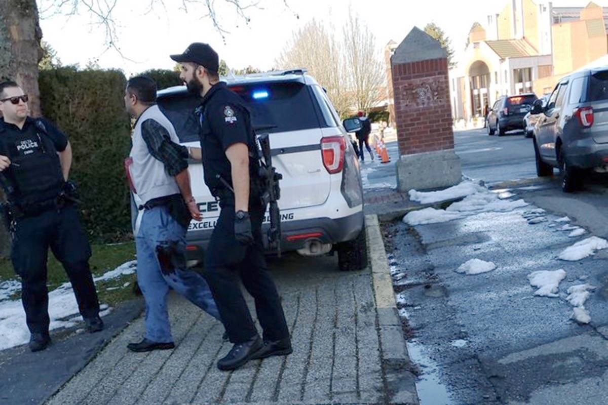 Manoj George, 49, of Delta is facing 10 charges, including attempted murder, aggravated assault and sexual assault with a weapon, after allegedly stabbing a woman and an off-duty DPD officer outside of Immaculate Conception elementary school on Wednesday, Feb. 20, 2019. (Ron Calliou/Twitter photo)