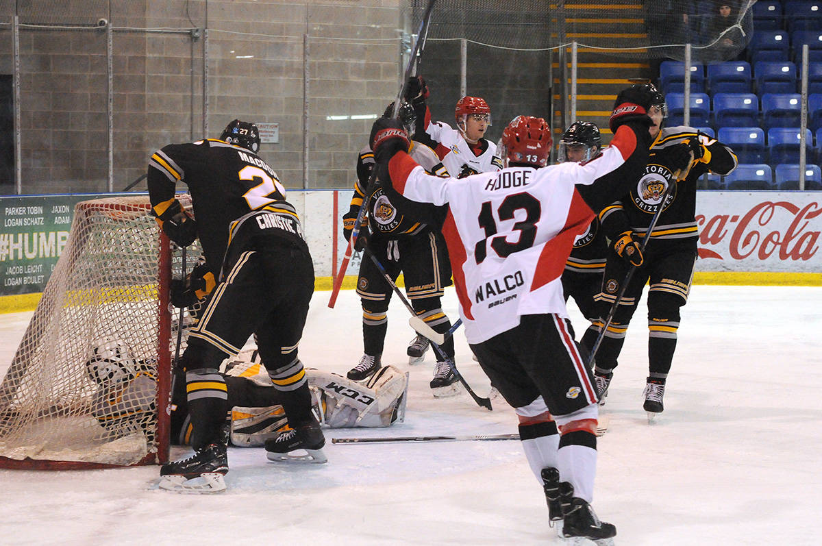 Alberni Valley Bulldogs’ leftwinger Michael Hodge celebrates his unassisted goal at 9:58 of the second period, which tied the Bulldogs’ game against Victoria Grizzlies 1-1 on Wednesday, March 6 at Weyerhaeuser Arena in Port Alberni. SUSAN QUINN PHOTO
