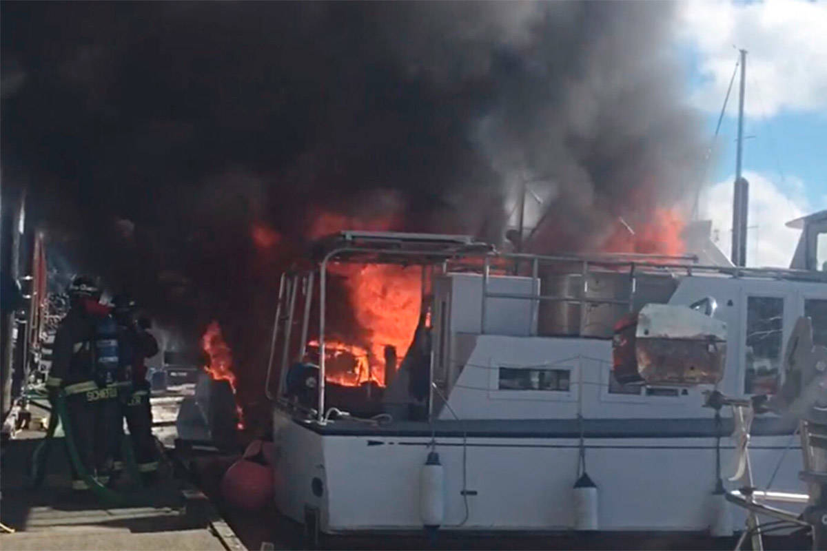 A photo posted to Twitter by the Campbell River Fire Department shows firefighters responding a boat fire in Discovery Harbour Marina on March 7.