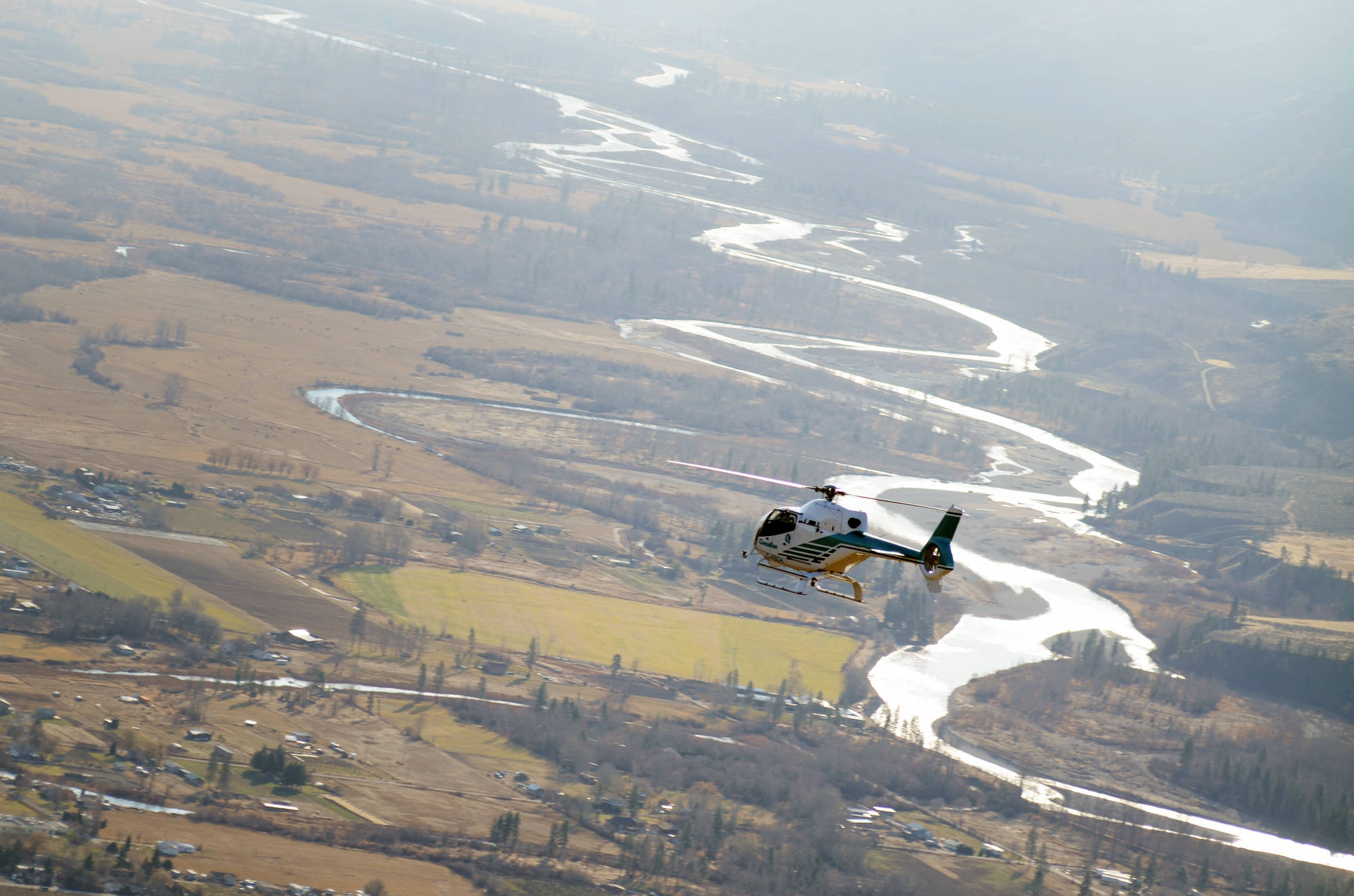 An HNZ Topflight (former Canadian) helicopter over a region of the Similkameen. (Western News file photo)