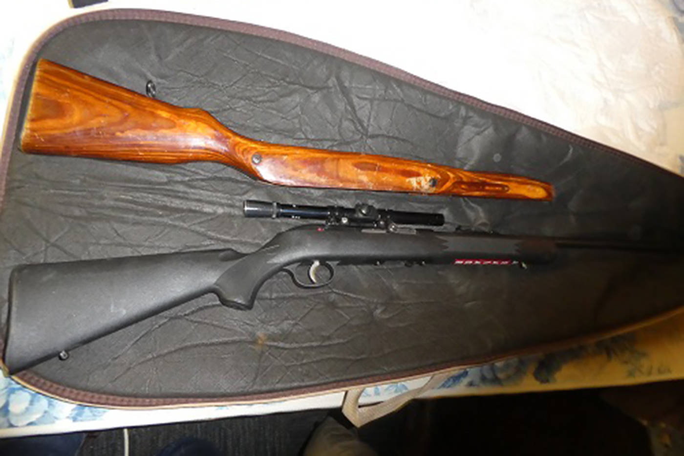 One of the guns seized, a semi-automatic SKS rifle, had been altered to include an aftermarket synthetic stock as well as a prohibited 21-round magazine. (West Shore RCMP)