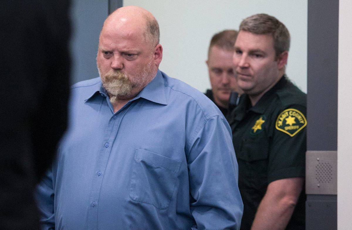 William Earl Talbott II, 55, of SeaTac, is led into court for arraignment in the 1987 death of Tanya Van Cuylenborg at the Skagit County Community Justice Center on Friday in Mount Vernon. (Andy Bronson / The Herald)