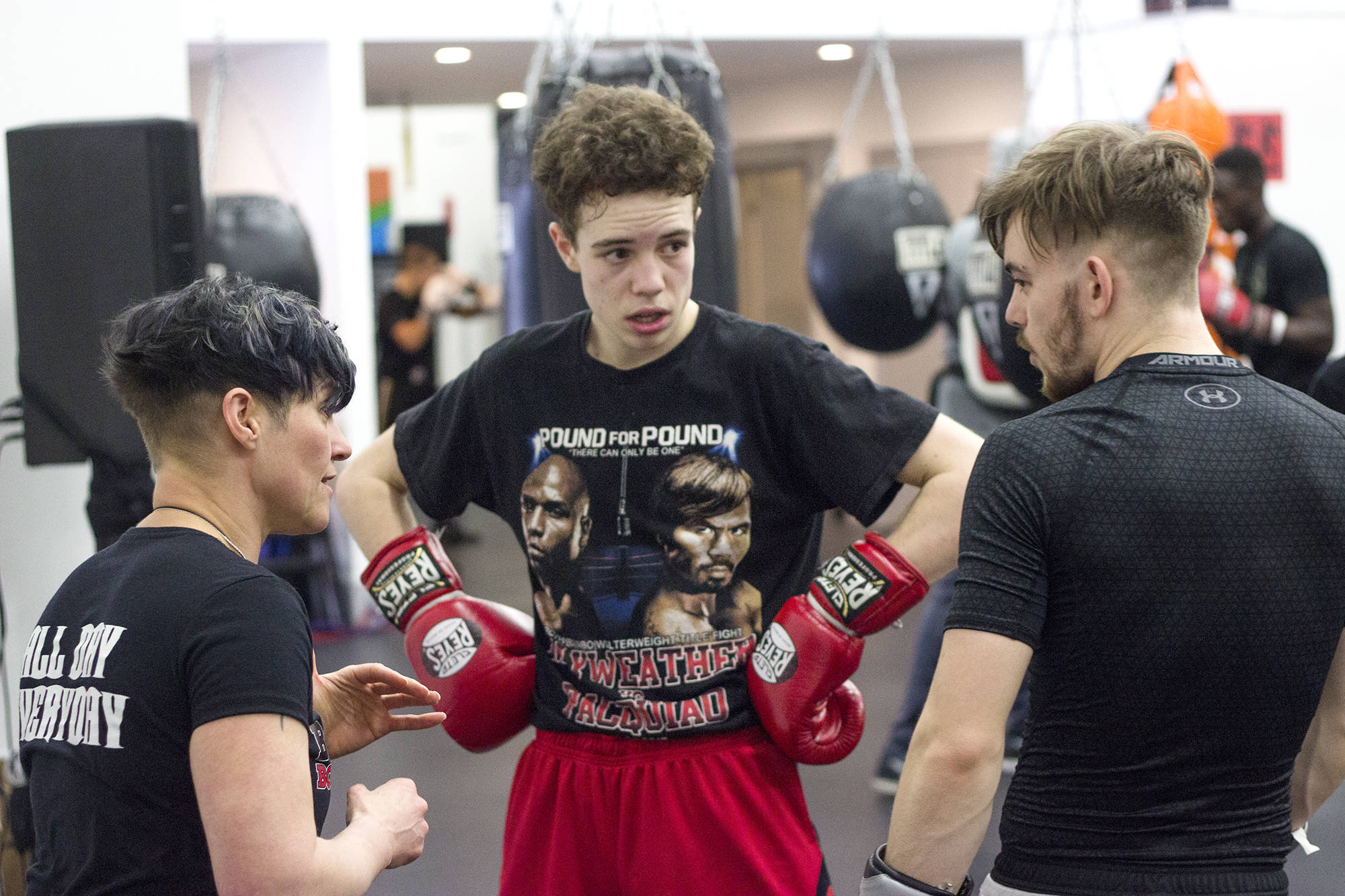 Team B.C. coach Peggy Maerz (left) gives boxers Dominic Barbosa (centre) and Connor Rankin (right) some technical tips during Team B.C.’s Nationals Training Camp at Bulldogs Boxing gym in Salmon Arm March 21. (Jodi Brak/Salmon Arm Observer)