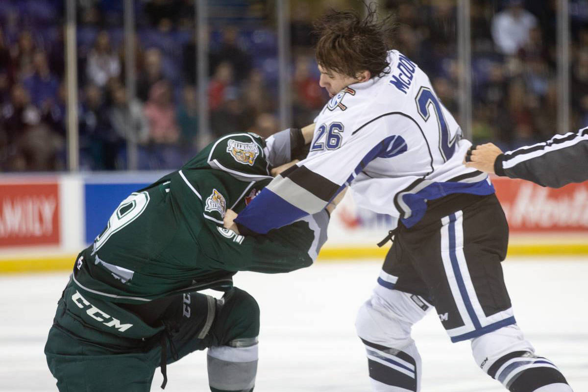 Victoria Royals player Kody McDonald, 20, (right) was handed an indefinite suspension following a match penalty during a playoffs game in Kamloops March 27. (Black Press Media file photo)