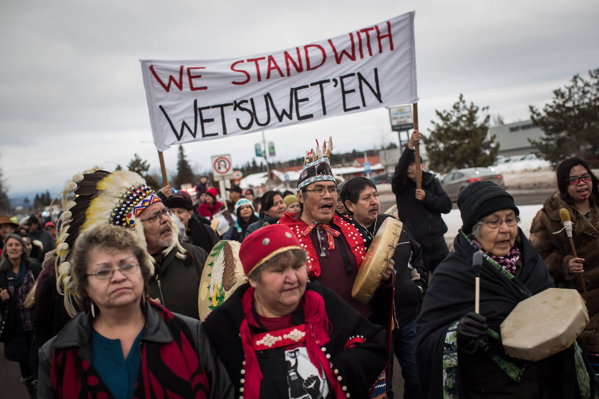 Hereditary Chief Ronnie West, centre, from the Lake Babine First Nation, sings and beats a drum during a solidarity march after Indigenous nations and supporters gathered for a meeting to show support for the Wet’suwet’en Nation, in Smithers, B.C., on January 16, 2019. More than 200 Canadian musicians and industry players are standing in solidarity with people from a northern B.C. First Nation as they protest the construction of a natural gas pipeline on traditional territories. THE CANADIAN PRESS/Darryl Dyck