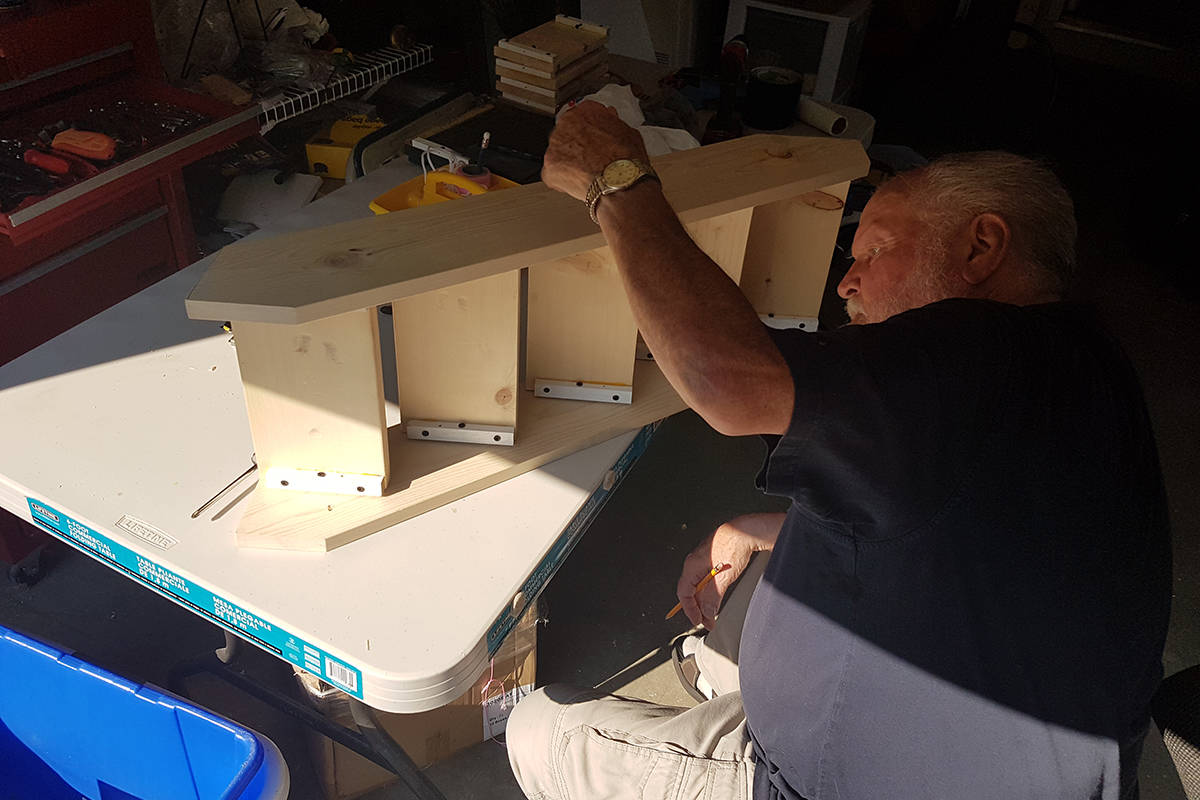 Art Hobbis works on building a set of pet stairs for Happy Bandit Pet Solutions. Photo courtesy of Corey Hobbis