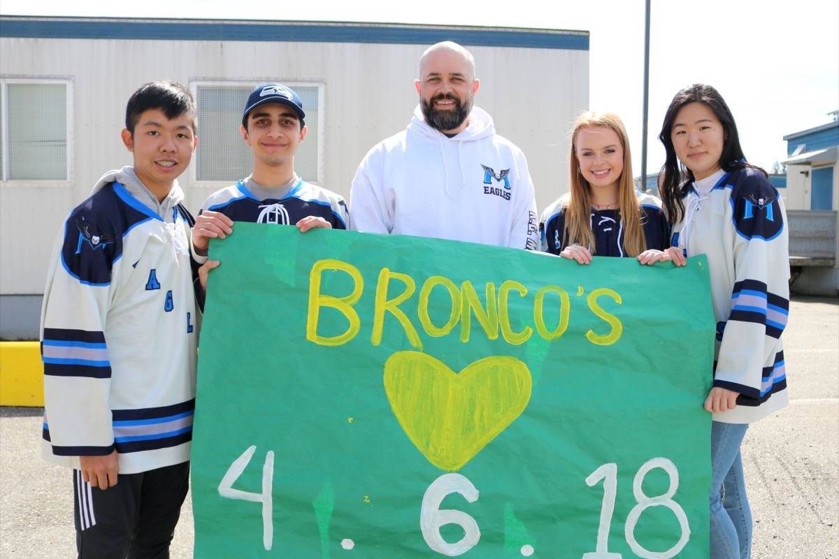 Stanley Lee (left), Hassan Khan, Kirk Weiss, Kinley Konrath, and Gloria Jung are asking the students at R.E. Secondary School to wear jerseys this Friday. Miranda Fatur Langley Advance Times