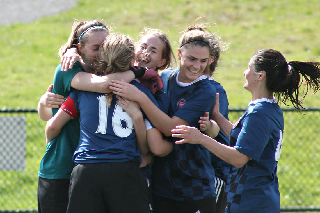 Nanaimo United’s premier women’s side celebrates after winning the Lower Island Women’s Soccer Association’s top prize, the Terry Price Cup, on Sunday in Saanich. (Photo submitted)