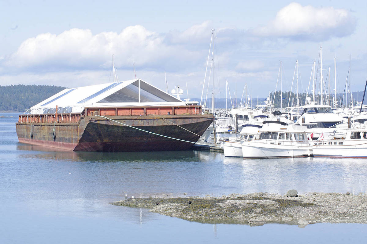 In 2018, a barge moored next to smaller vessels involved in the BC Boat Show held exhibition space. (News Review file photo)
