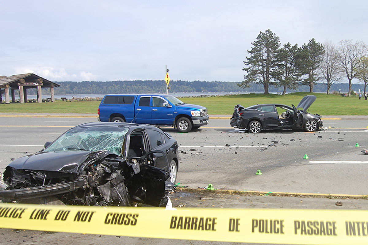 A car appears to have crossed the centre line and collided head-on with another vehicle at the corner of Highway 19A and Shoppers Row on Sunday afternoon. Photo by David Gordon Koch/Campbell River Mirror