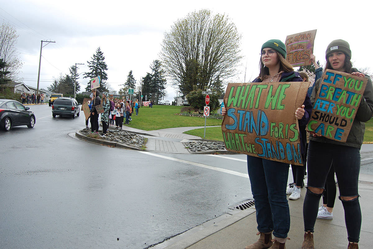 Students called for action to curb climate change and a ban on plastic bags and straws during a protest outside city hall in Campbell River on April 5. Photo by David Gordon Koch/Campbell River Mirror