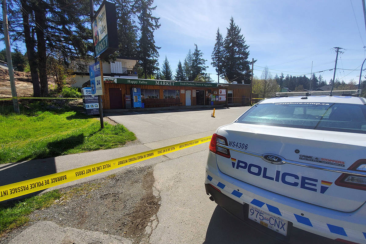 The Happy Valley Market is cordoned off by police tape after reports of a shooting late Tuesday morning. (Swikar Oli/News Staff)