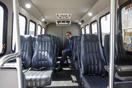 Sunny Balwaria, president of Cold Shot bus services, is pictured on one of his buses in Edmonton on Tuesday, April 23, 2019. (THE CANADIAN PRESS/Jason Franson)