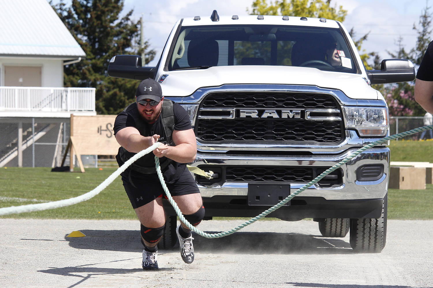 The first event of the strong(wo)man competition tasked challengers with pulling a truck a certain distance. Photo by Jolene Rudisuela