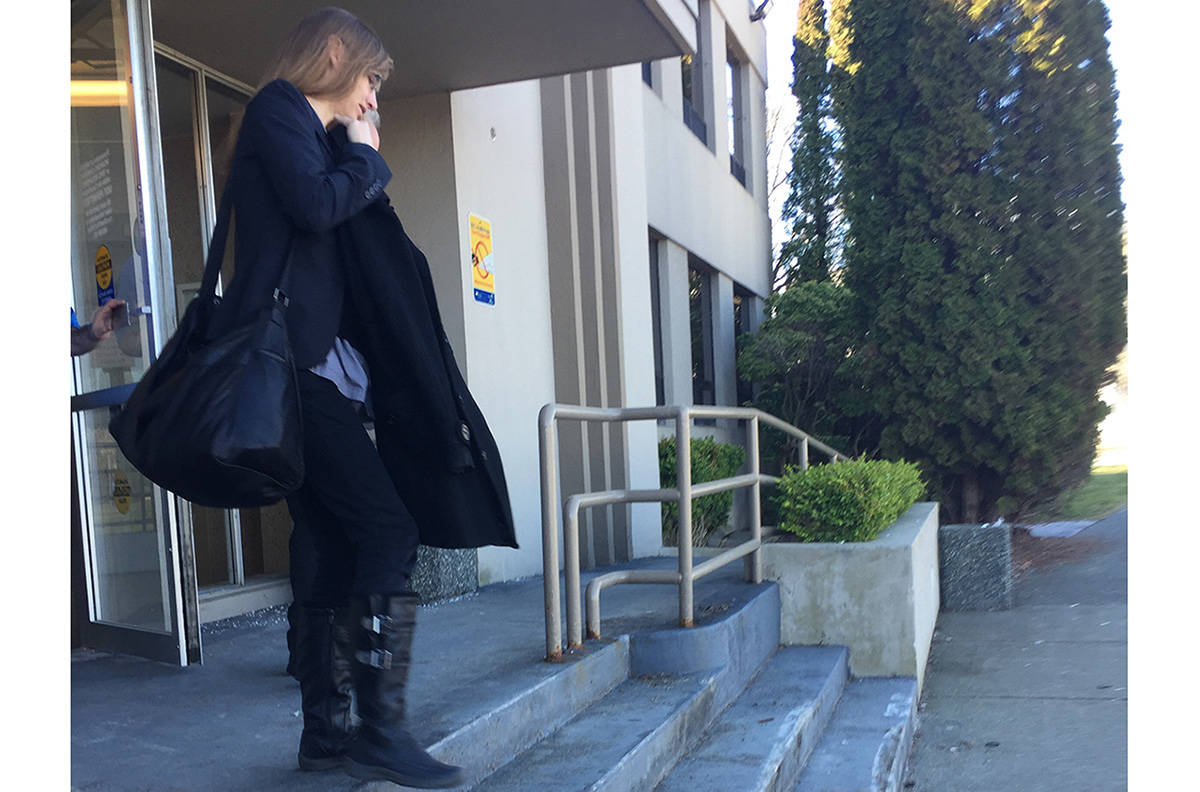 Brandy Dawn Bishop leaves the Courtenay Law Courts building Friday afternoon.