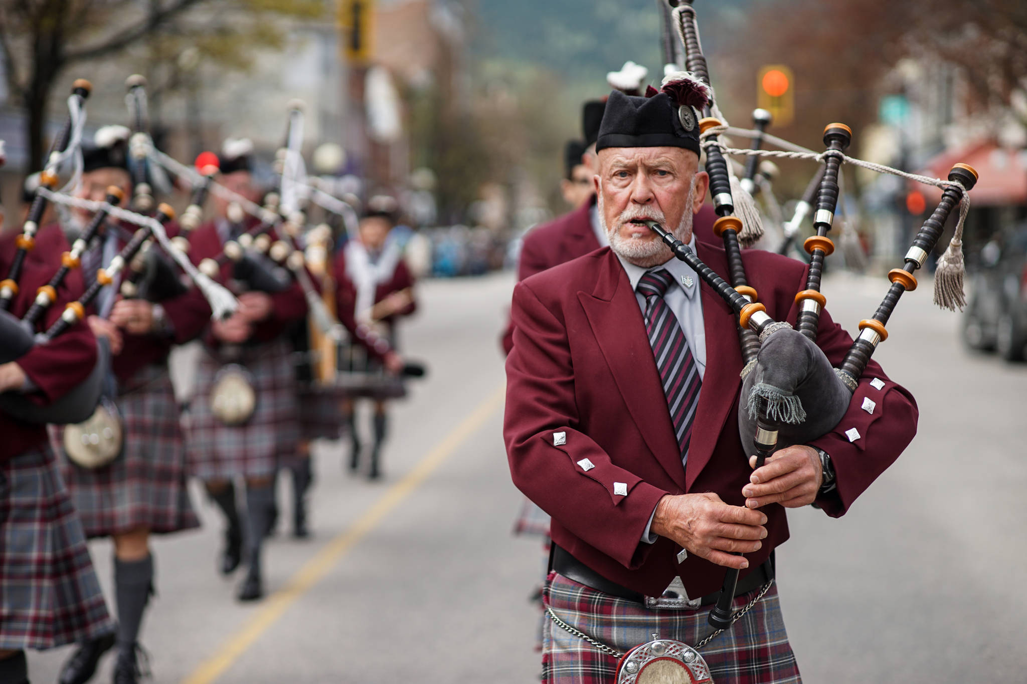 A member of the Kalamalka Highlanders Pipe Band based in Vernon march down Baker Street during the annual spring fling hosted in Nelson on Saturday. Photo: Jake Sherman