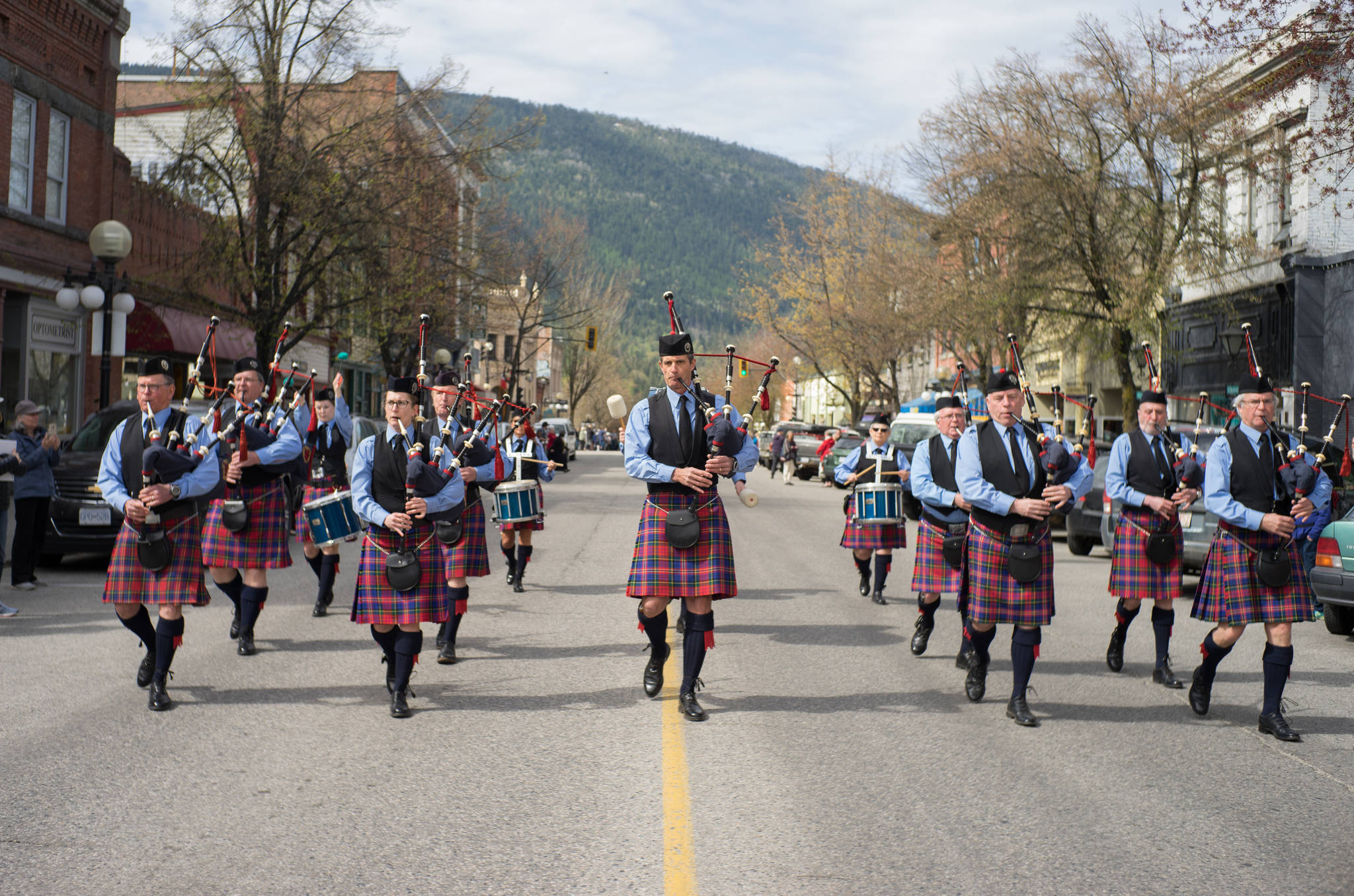 The Kootenay Kiltie Pipe Band leads the parade as they march along Baker Street on Saturday. Photo: Jake Sherman
