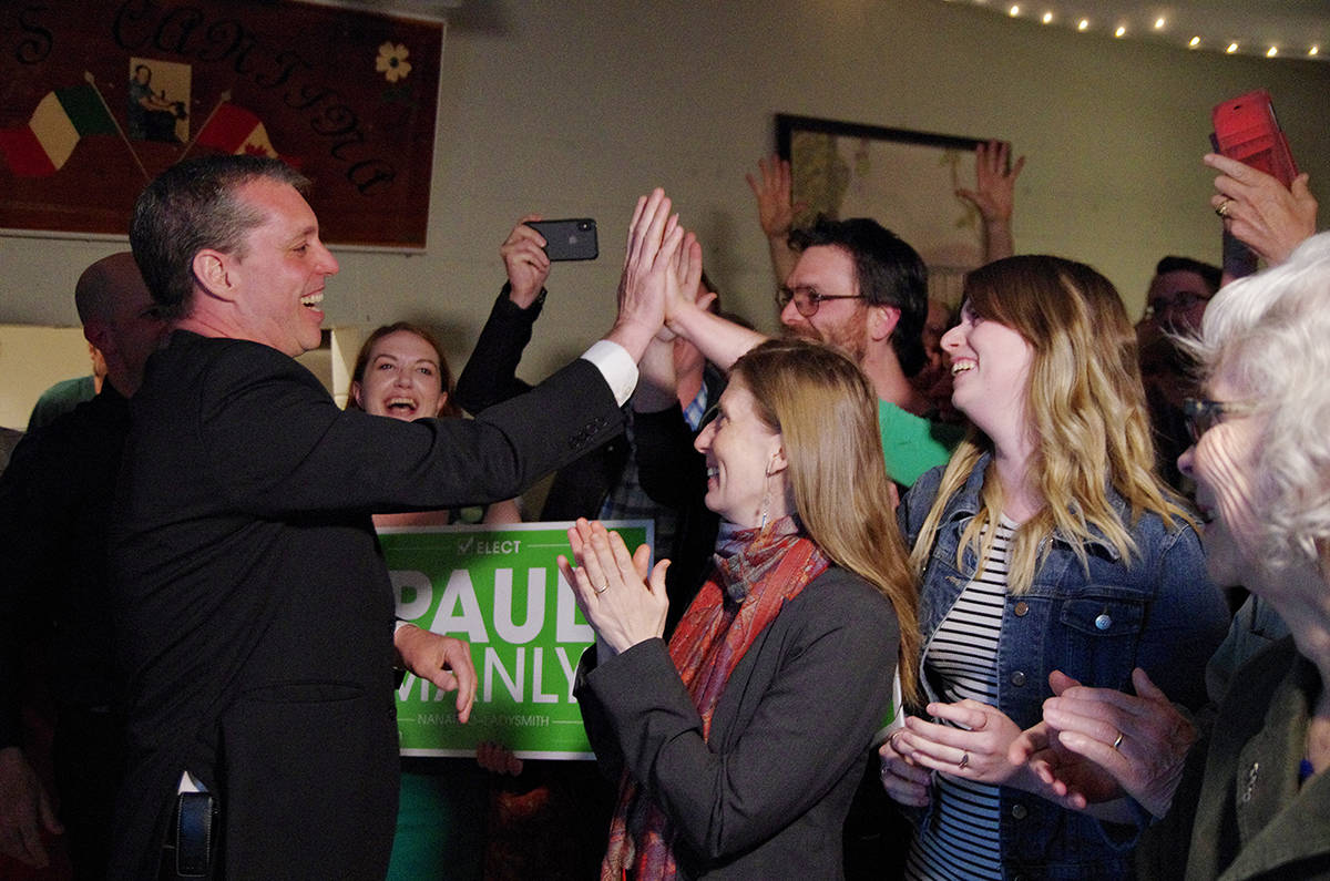Nanaimo-Ladysmith MP-elect Paul Manly of the Green Party of Canada celebrates with family and friends Monday at his campaign celebration at the Cavallotti Lodge. (Chris Bush photo)
