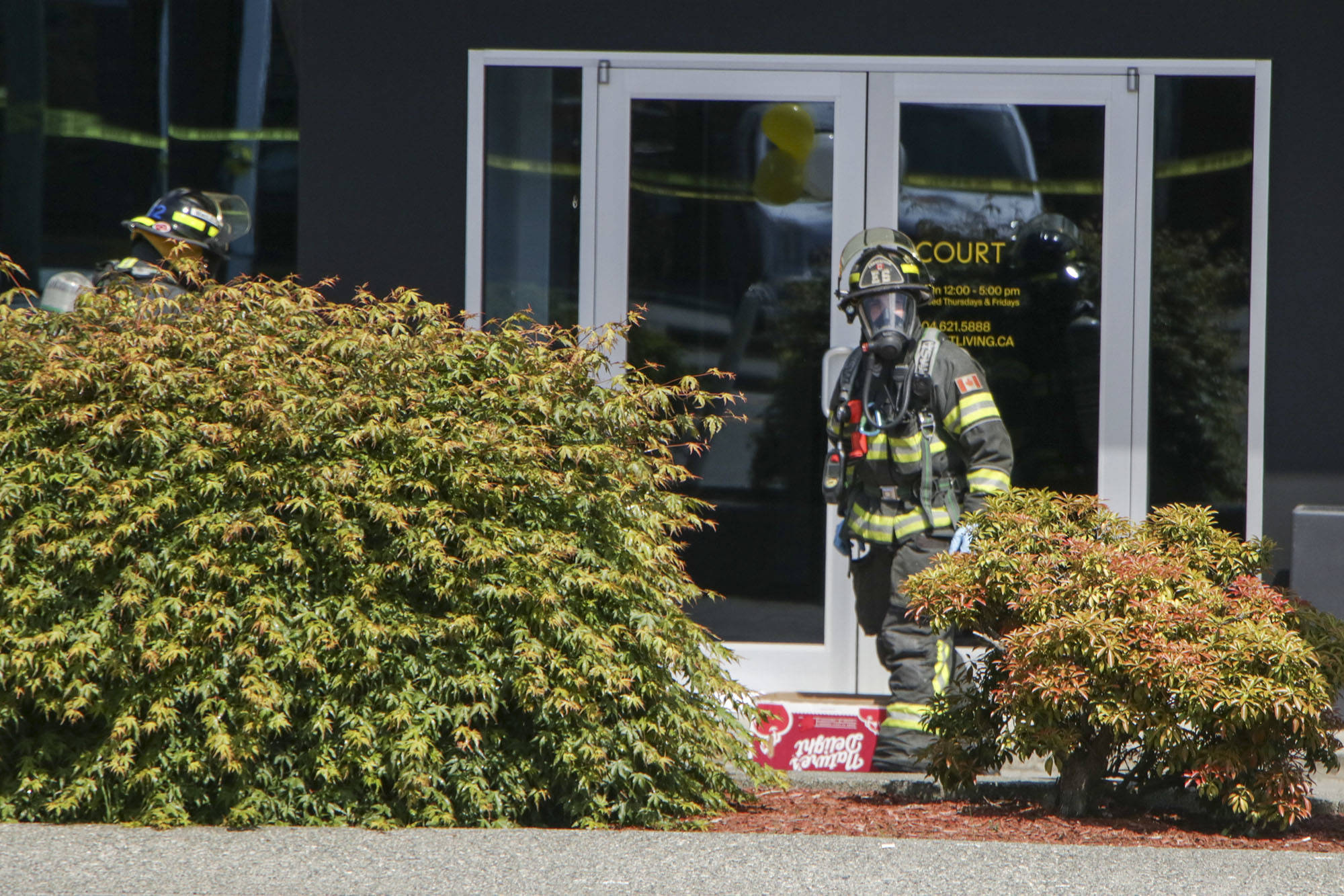 Employees recover after breathing fumes from package sent to offices of B.C. development