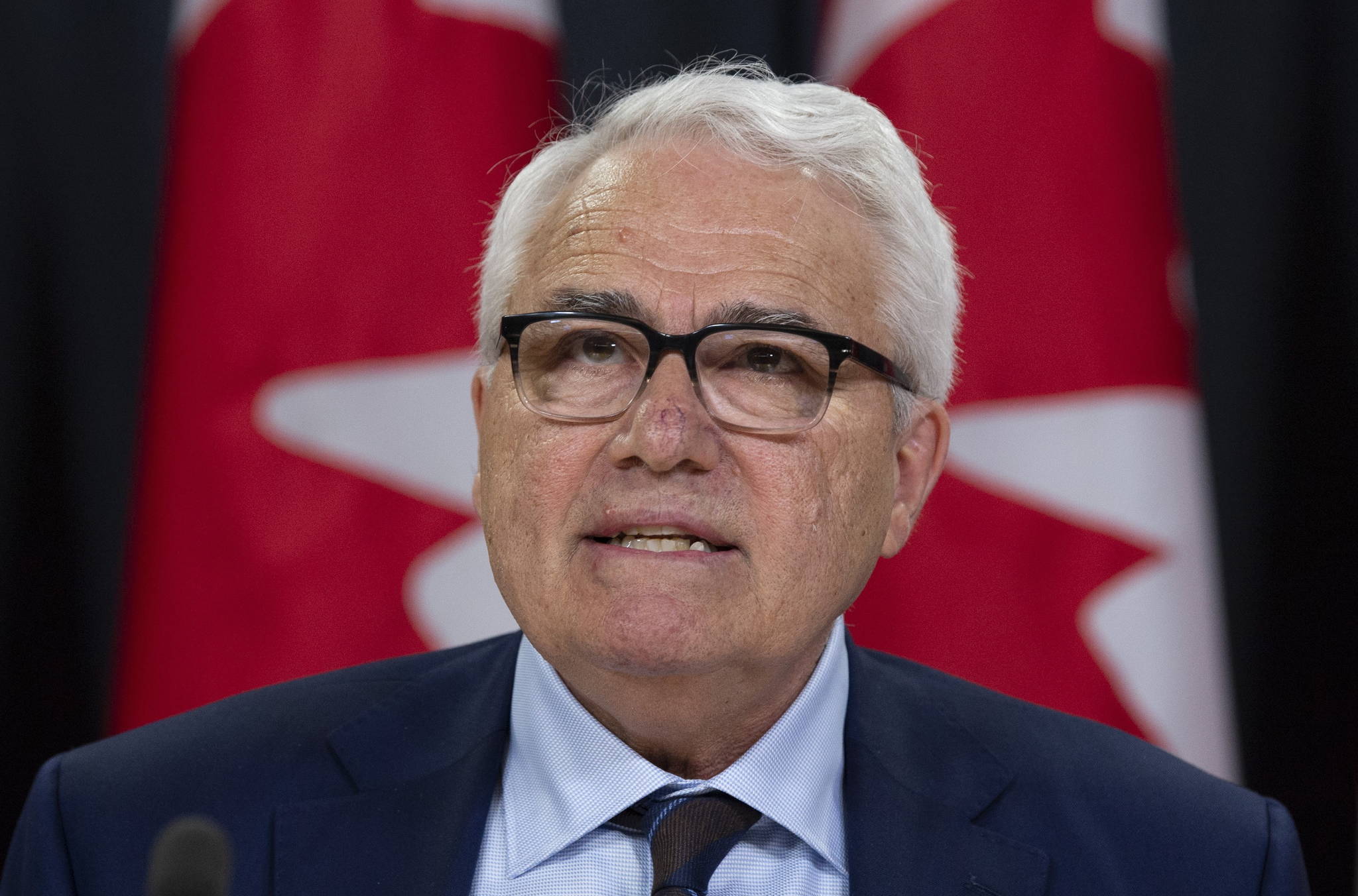 Official Languages Commissioner Raymond Theberge responds to a question during a news conference in Ottawa, Thursday May 9, 2019. THE CANADIAN PRESS/Adrian Wyld