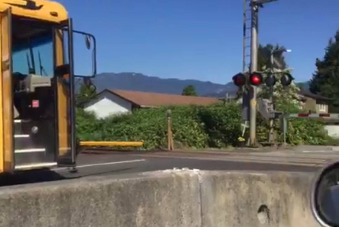 Chilliwack bus driver on wrong side of road wasn’t unsafely crossing train tracks: school district