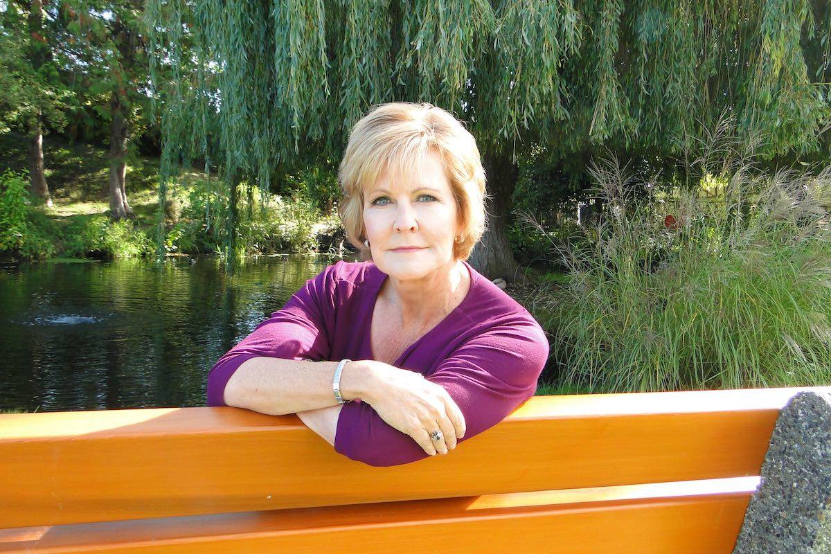 Erin Davis seated on the Iroquois Park bench dedicated to her daughter Lauren, who tragically passed away in her sleep on May 11, 2015. (Davis Family Archives)