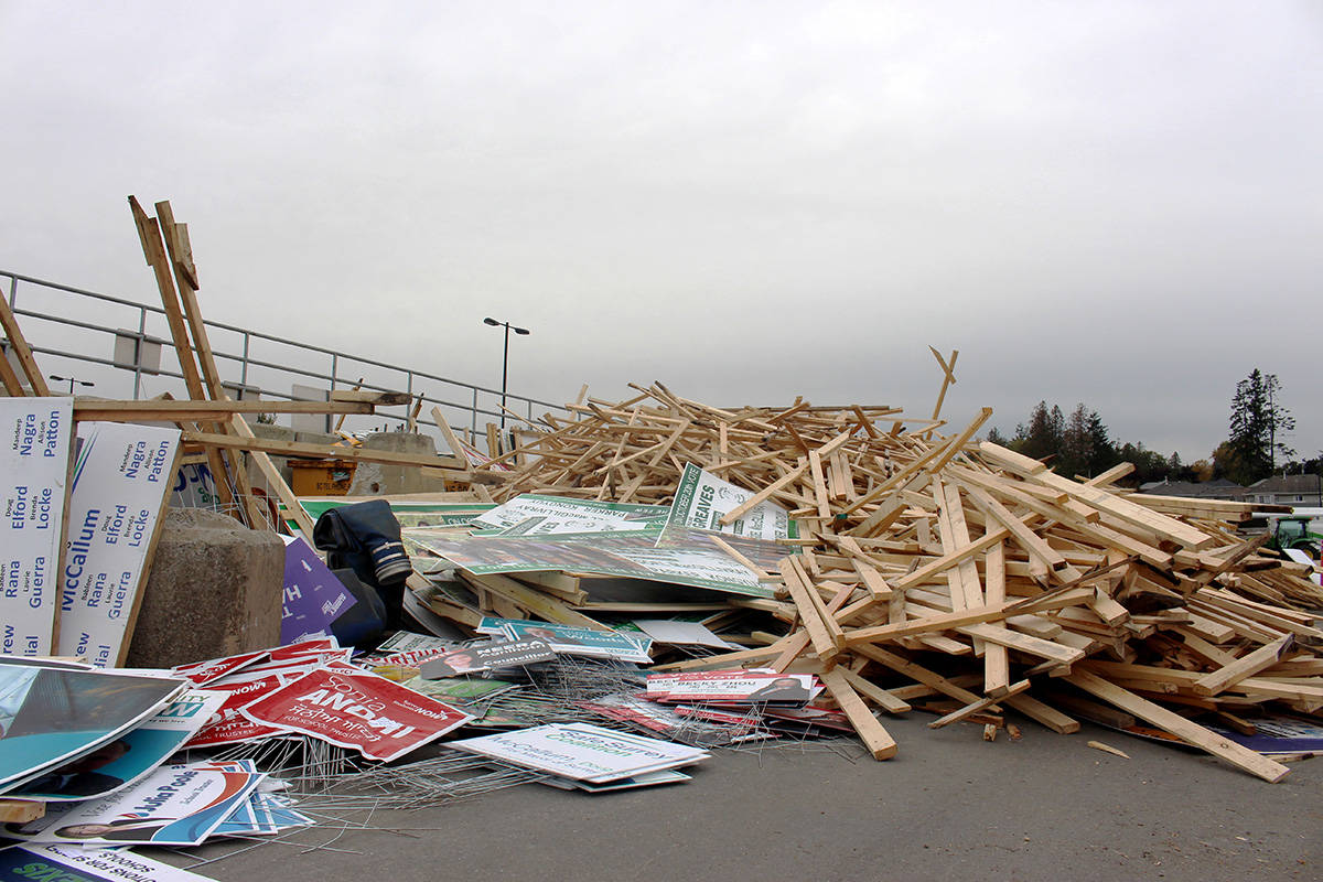A pile of election signs removed by City of Surrey in the 2018 civic election, due to their placement not confirming to city rules. (File photo/Lauren Collins)